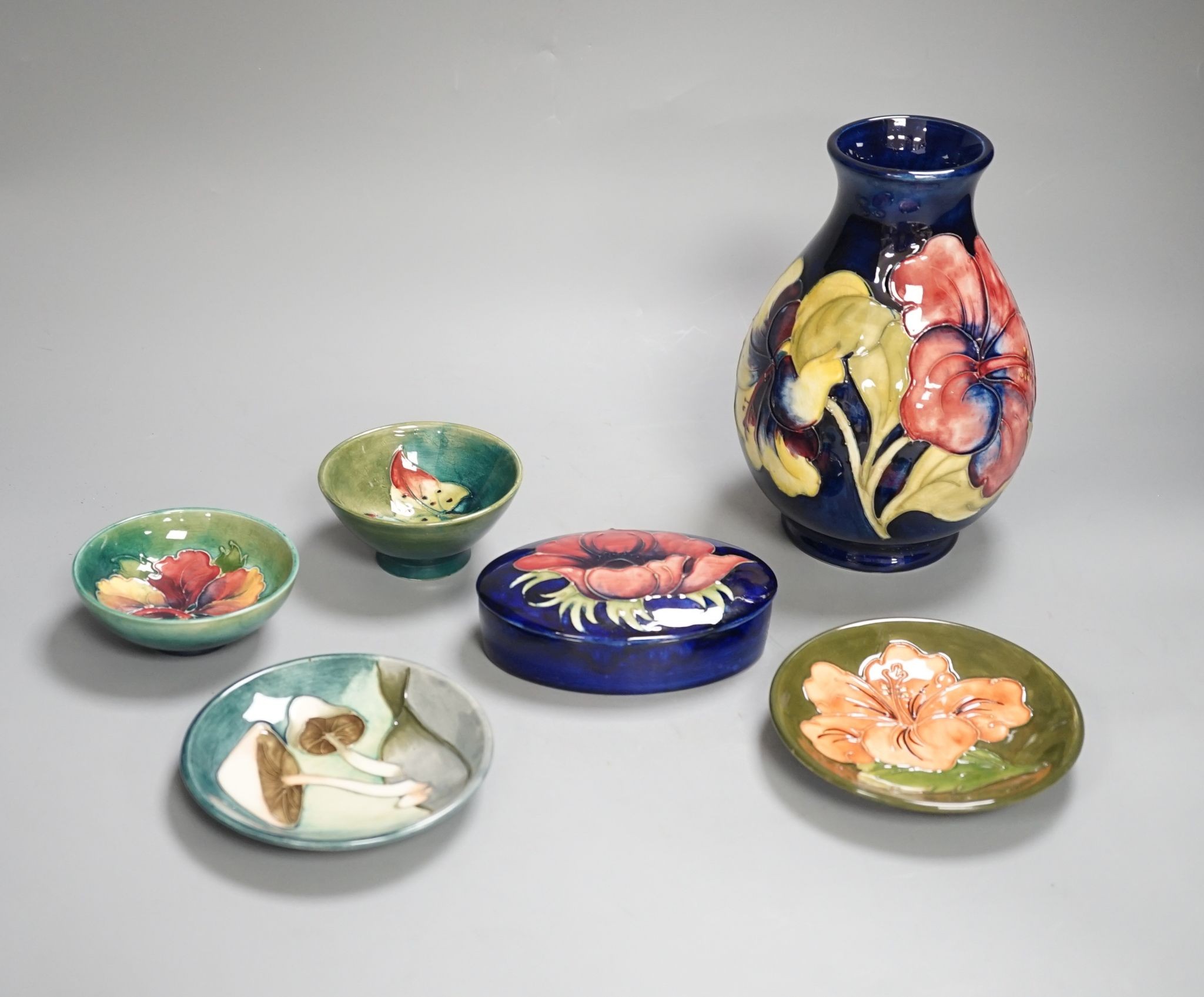 A Moorcroft vase, a similar box, 2 dishes and 2 bowls, Vase 29 cms high.